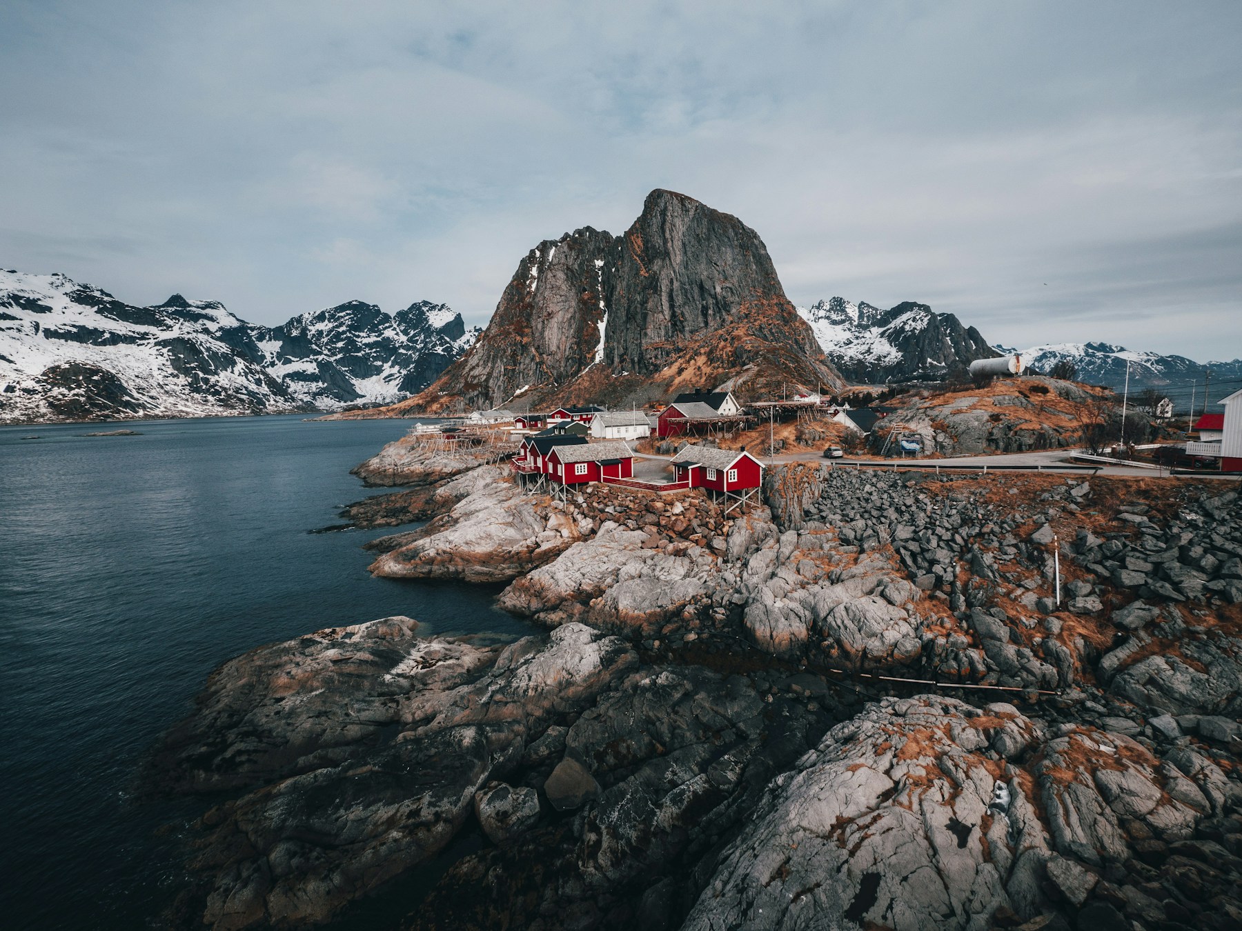Coastal community surrounded by mountains and sea